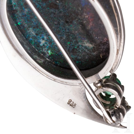 A 14ct white gold opal and diamond brooch (ca. 0.1ct)