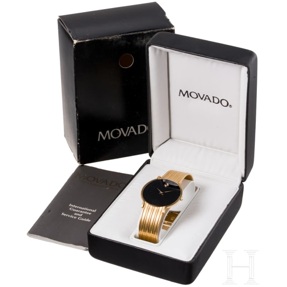 An 18-carat gold and quartz black dial Movado wristwatch with presentation box