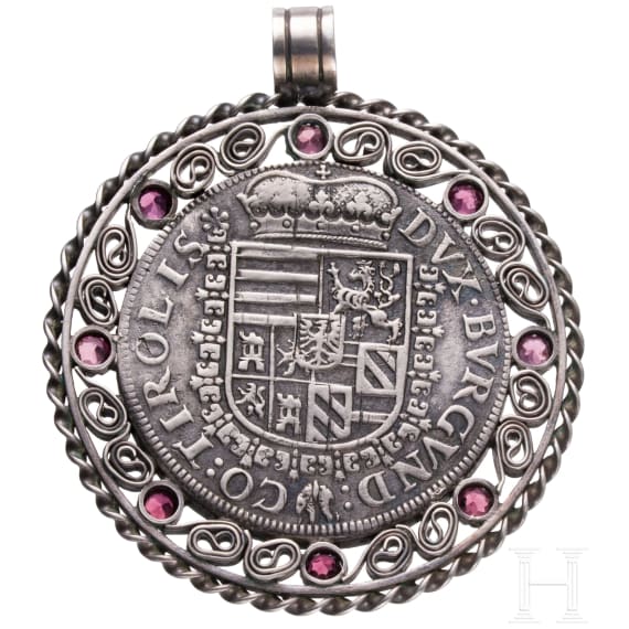 A silver and ruby pendant with coin "Ferdinand-Taler" (Archduke Ferdinand (1564-95)), undated