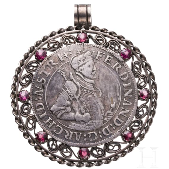 A silver and ruby pendant with coin "Ferdinand-Taler" (Archduke Ferdinand (1564-95)), undated