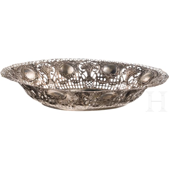 A silver bowl with putti, German, circa 1870
