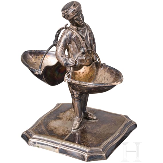 A figural silver salt cellar, German, Schw&auml;bisch Gem&uuml;nd, Gebr&uuml;der K&uuml;hn (founded 1860), circa 1900