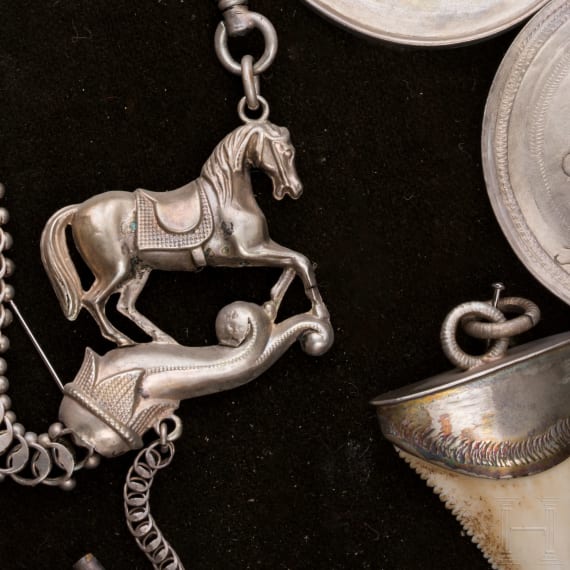 A group of German and Polish silver trinkets including a shooting champion's necklace, 19th century