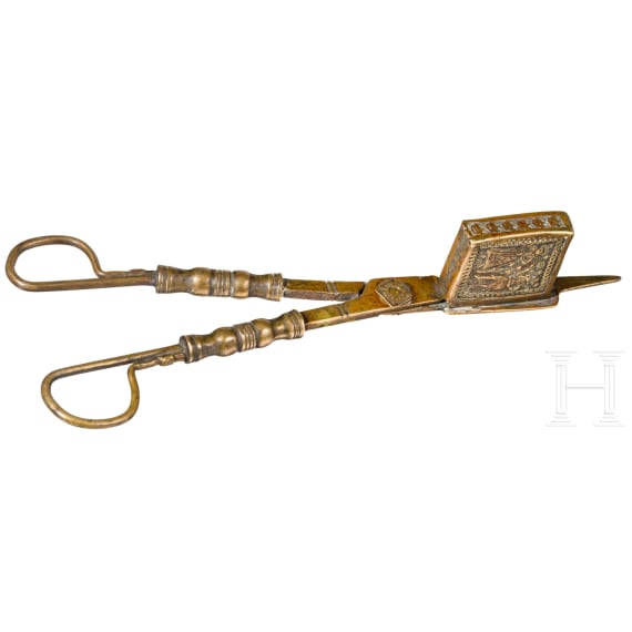 A Nuremberg brass candle snuff, 17th century