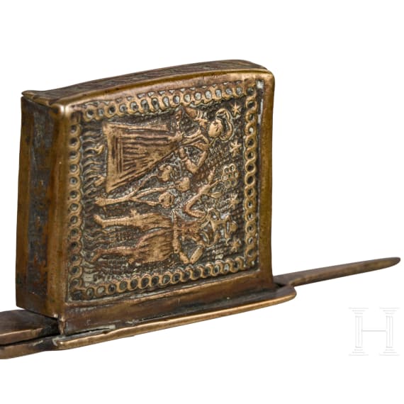 A Nuremberg brass candle snuff, 17th century