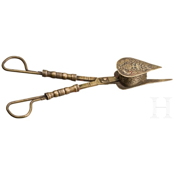 A Nuremberg brass candle snuff, 17th century
