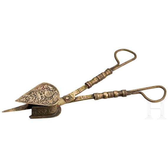 A Nuremberg brass candle snuff, 17th century
