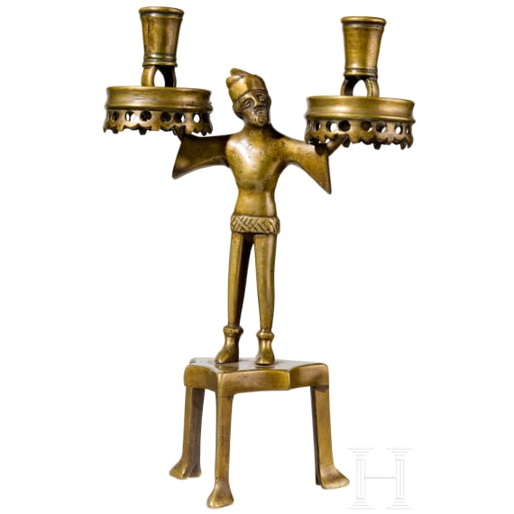 A figural brass candlestick in Nuremberg gothic style, ca. 1880