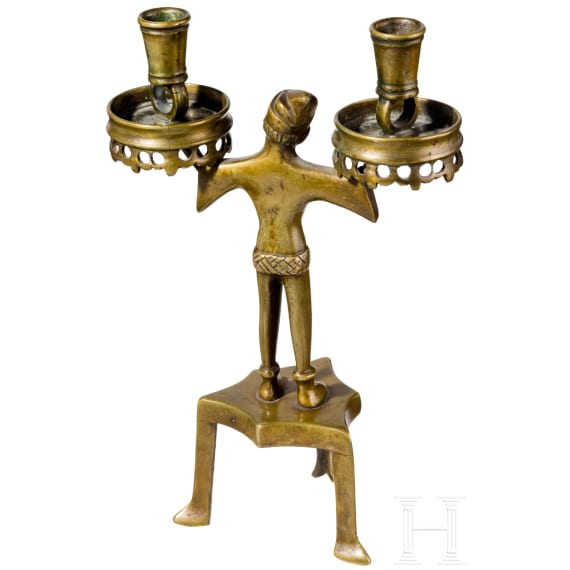A figural brass candlestick in Nuremberg gothic style, ca. 1880