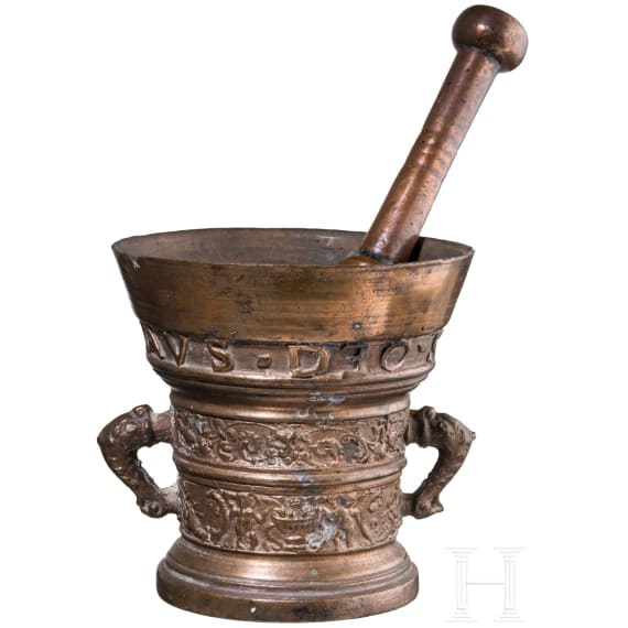A bronze mortar, dated 1654