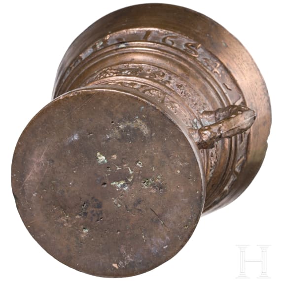 A bronze mortar, dated 1654