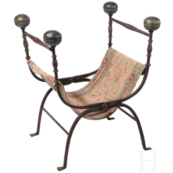 Faldstool, Italy, 17th century, in part 19th century, wrought iron, brass finials, textile seat