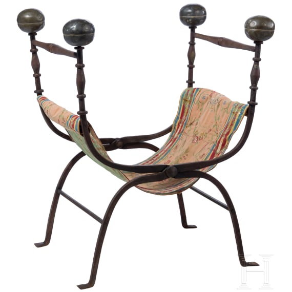 Faldstool, Italy, 17th century, in part 19th century, wrought iron, brass finials, textile seat