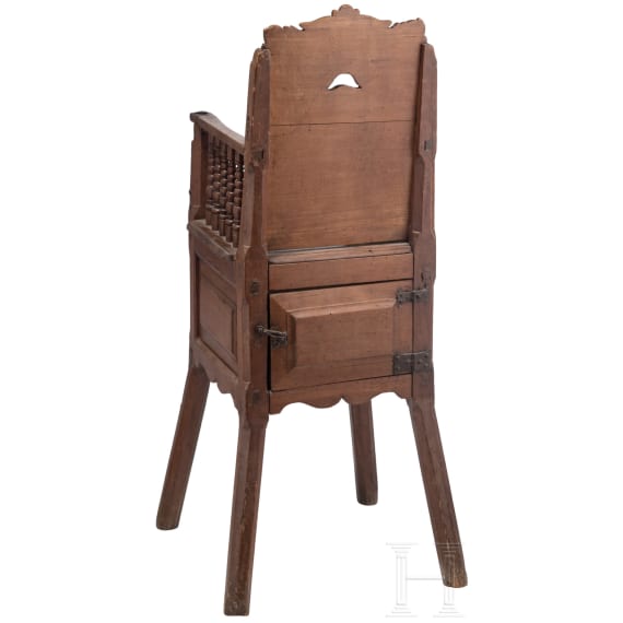 A French high chair with carved mascaron, circa 1700