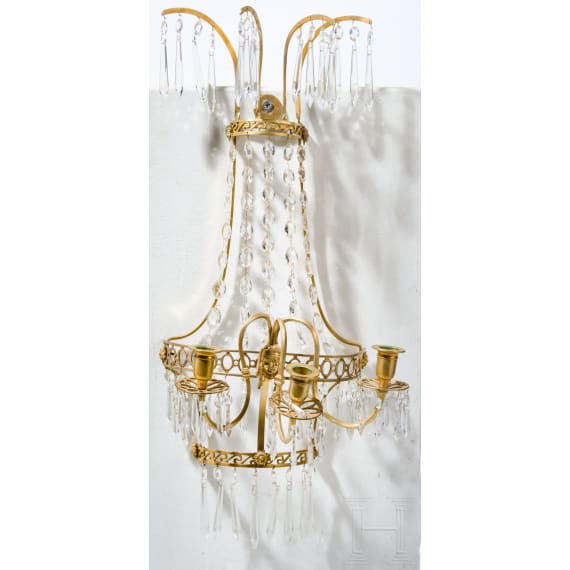 A gilt bronze three-arm wall sconce, attributed to Berlin, Bronzefactory Christian Gottlob Werner & Gottfried Mieth, Berlin, circa 1800