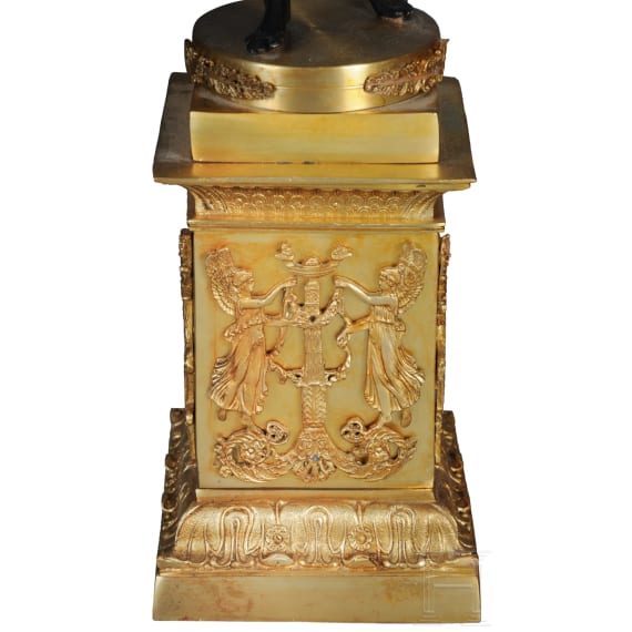 A pair of French partially gilt bronze candelabras, probably 20th century