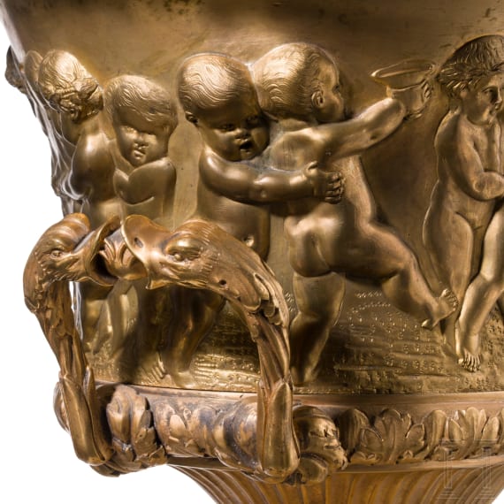 A centerpiece with putti frieze, France, probably late 19th century, cast brass with gilt-coloured finish