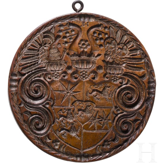 A Swiss double sided wooden butter mould, dated 1583
