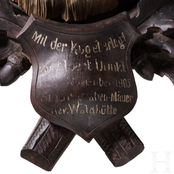A wooden Berchtesgaden foxhead trophy, dated 1905