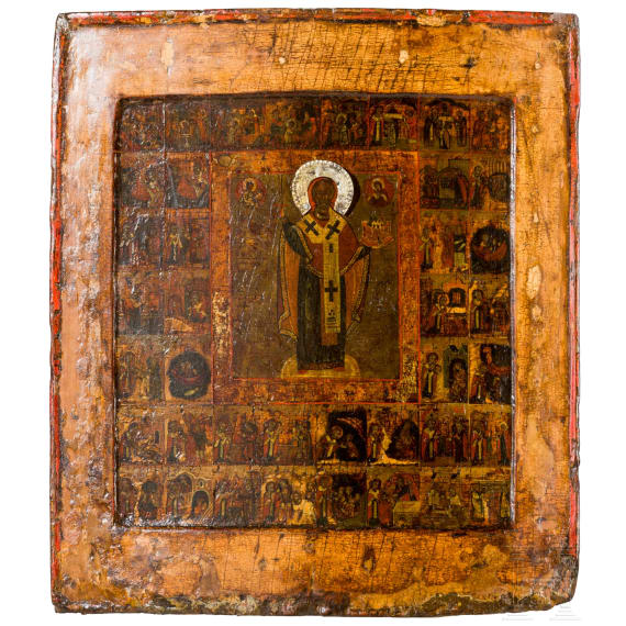 A Russian icon showing Saint Nicholas of Mozhaisk with 40 scenes of his life with silver halo, Russia, 18th century