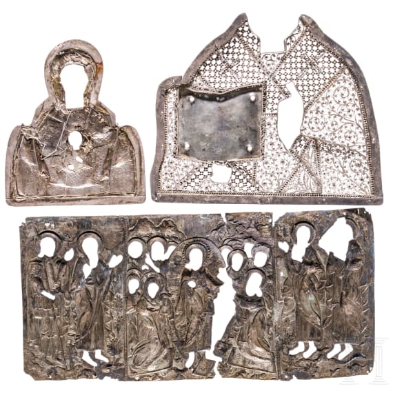 Three silver oklad fragments: Silver filigree fragment of a Saint, Silver filigree fragment of the Mother of God of the Sign and silver-gilt fragment of feast icon, Russia, 19th century
