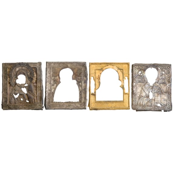 Two silver icon oklads, one silver basma and a gilt-brass basma, Russia, 19th century -Vladimir, 1848 (one), St.Petersburg, 1876 (one)