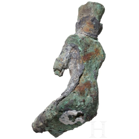 Bronze statuette of the seated god Amun and bronze insert of a crown with sun disc and double feather. Late period, middle third of the 1st millennium B.C.