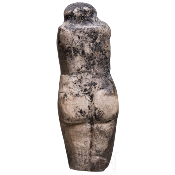 A rare androgynous stone idol, Near East, 3rd&ndash;2nd millennium BC