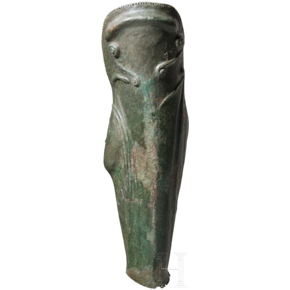 A Greek greave in bronze, anatomically formed, 5th century B.C.
