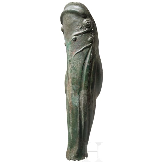 A Greek greave in bronze, anatomically formed, 5th century B.C.