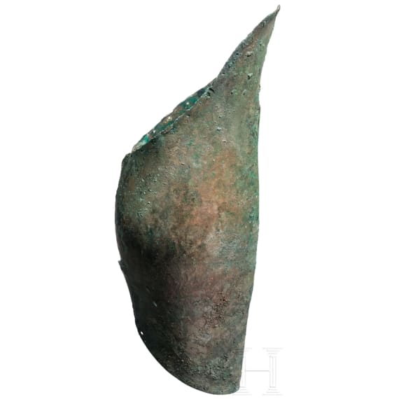 A Greek greave in bronze, anatomically formed, 5th century B.C.