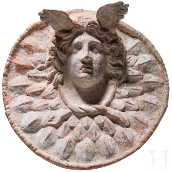 A painted terracotta tondo, Gorgoneion, Magna Graecia, Canosa, 3rd century B.C.