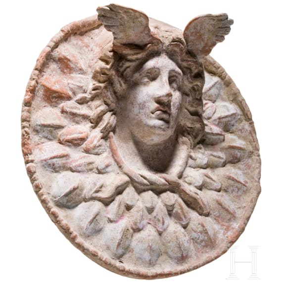 A painted terracotta tondo, Gorgoneion, Magna Graecia, Canosa, 3rd century B.C.