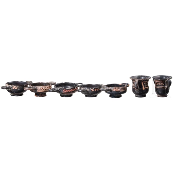 18 miniature vessels made of black glazed pottery, southern Italy, 4th &ndash; 3rd century B.C.