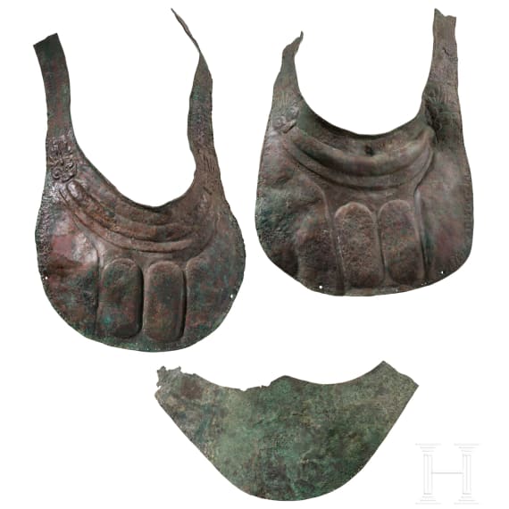 Two South Italian ornate peytrals for horses of a two-horse chariot, plus a simple breastplate, 5th &ndash; 4th century B.C.