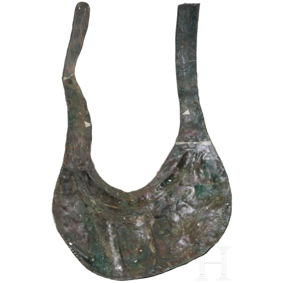 Two South Italian ornate peytrals for horses of a two-horse chariot, plus a simple breastplate, 5th &ndash; 4th century B.C.