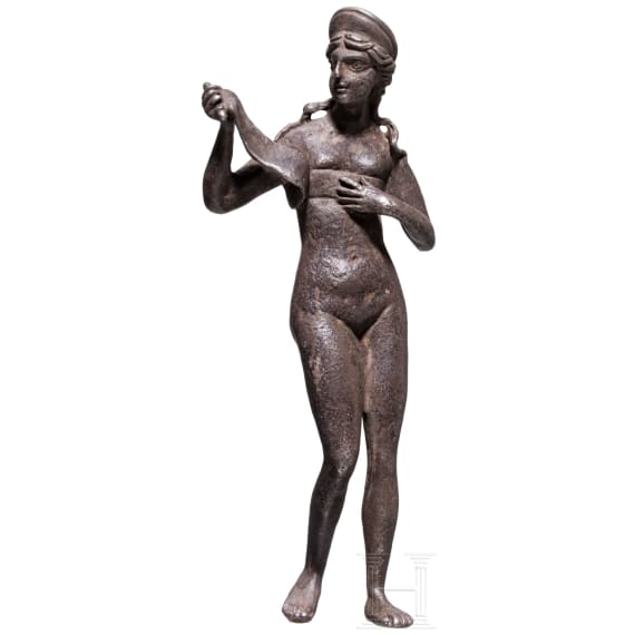 A Roman silver statuette of Venus loosening her breast band, 2nd &ndash; mid-3rd century A.D.