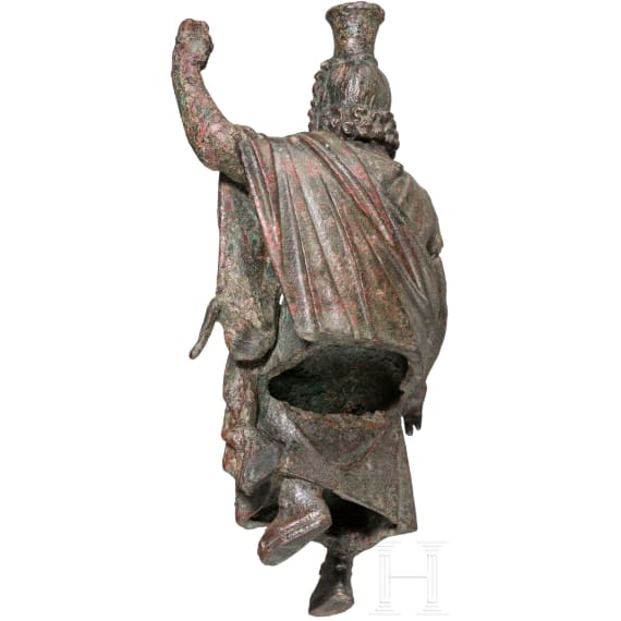An enthroned Roman bronze statuette of Serapis, 2nd - 3rd century