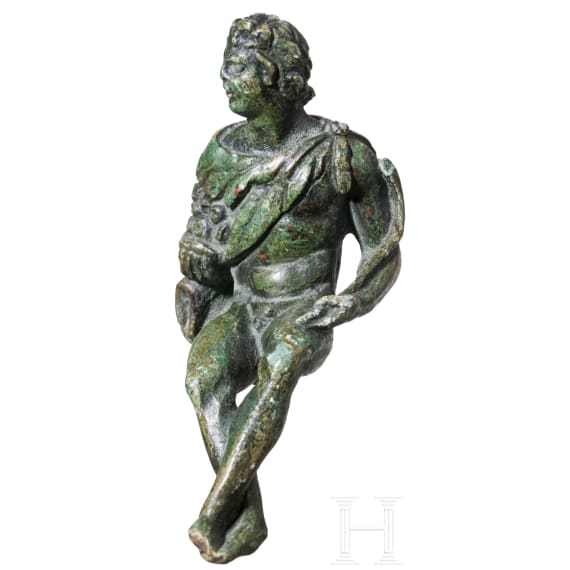 A Bronze Statuette of a Seated Faun, Roman, 1st &ndash; 2nd Century A.D.