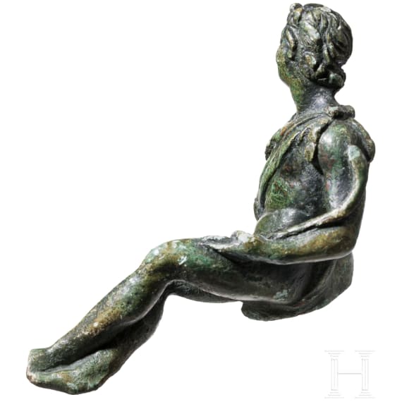 A Bronze Statuette of a Seated Faun, Roman, 1st &ndash; 2nd Century A.D.