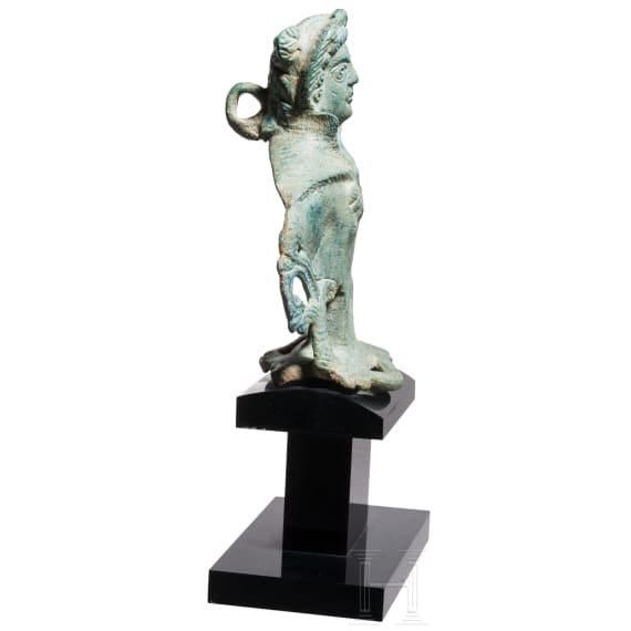 A Roman chariot ornament, bust of Hercules, bronze, 2nd &ndash; 3rd century A.D.