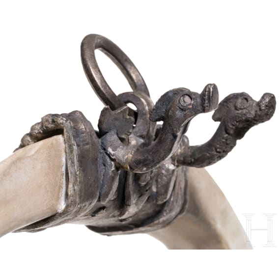 A late Roman silver pendant with two dolphins, circa 400 A.D.
