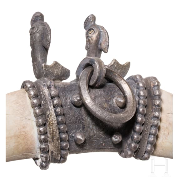 A late Roman silver pendant with two dolphins, circa 400 A.D.