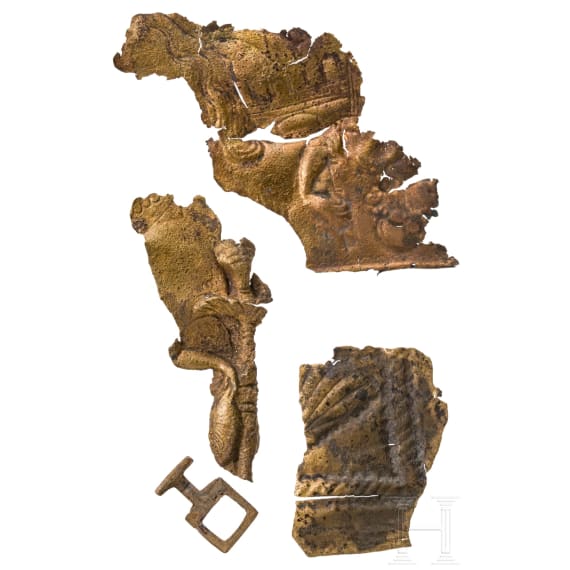 Frontal plate made of bronze sheet from a Roman helmet with an inscription, along with four fragments of an armour clasp, Roman, 2nd &ndash; early 3rd century A.D.