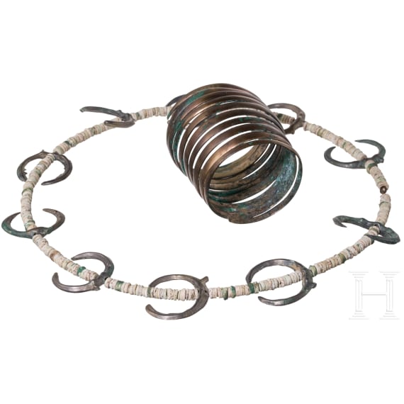 A Bronze Age jewelry set consisting of lunulae, beads, and spiral bracelet, 15th&ndash;14th century B.C.