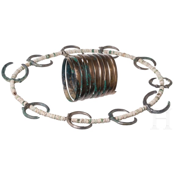 A Bronze Age jewelry set consisting of lunulae, beads, and spiral bracelet, 15th&ndash;14th century B.C.
