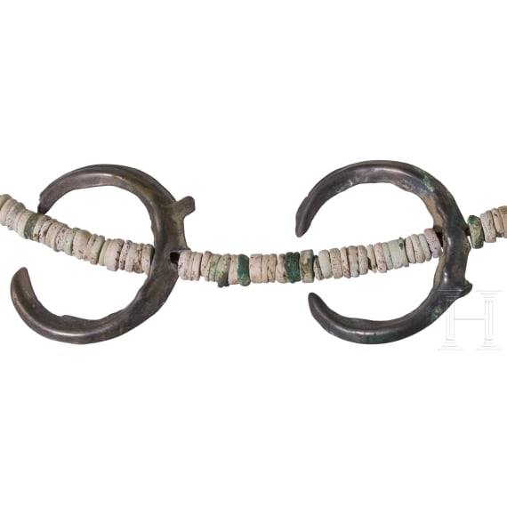 A Bronze Age jewelry set consisting of lunulae, beads, and spiral bracelet, 15th&ndash;14th century B.C.