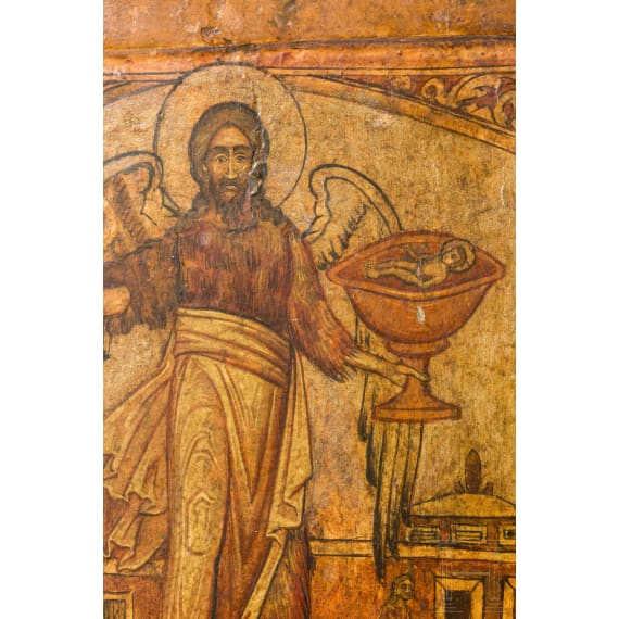 A Russian icon showing St. John the forerunner, his birth and his beheading, circa 1700 (overpaintings)