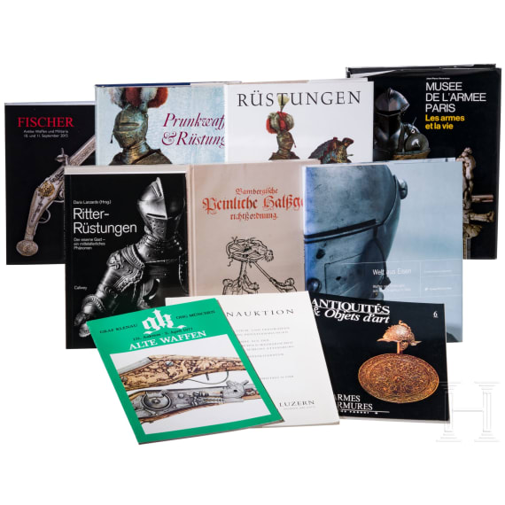 A large collection of books on armour and ancient weapons