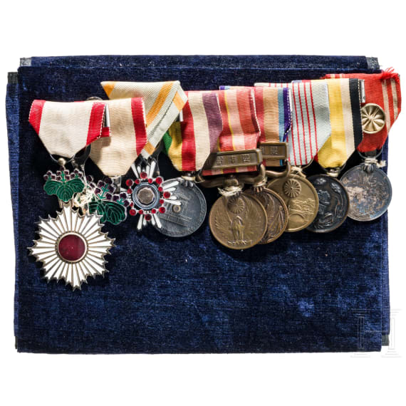 A large medal bar with 9 decorations